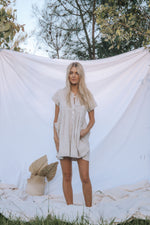 Load image into Gallery viewer, The Bambino Doll Mini Dress in Natural
