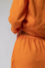 Load image into Gallery viewer, THE REMI SKIRT IN ORANGE SODA
